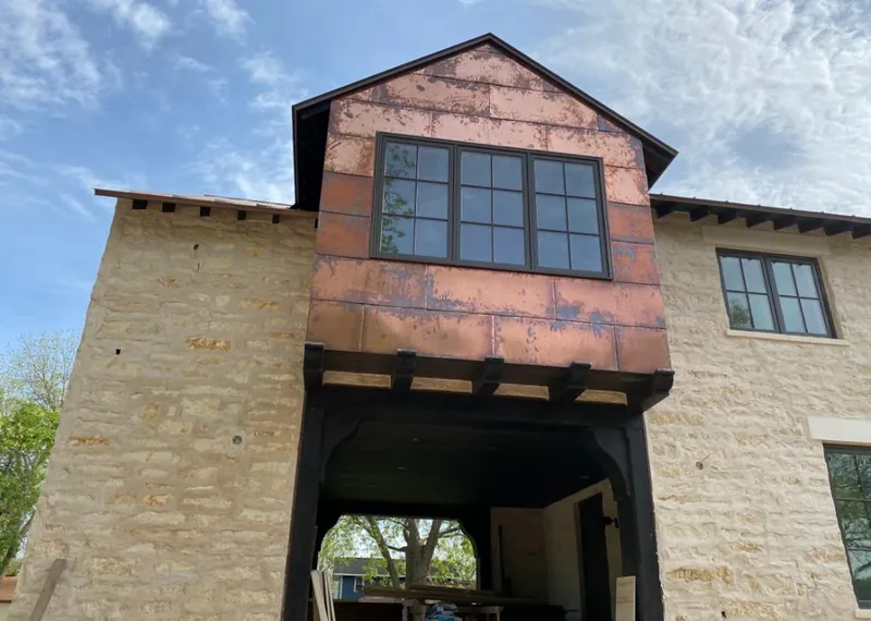 Copper metal panel facade on a stone building for Metal Roof Coating in Upper Pottsgrove